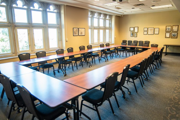 Gus T. Ridgel Room (S204) with desk and chairs