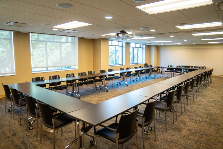 2205A&B room with a desk and chairs