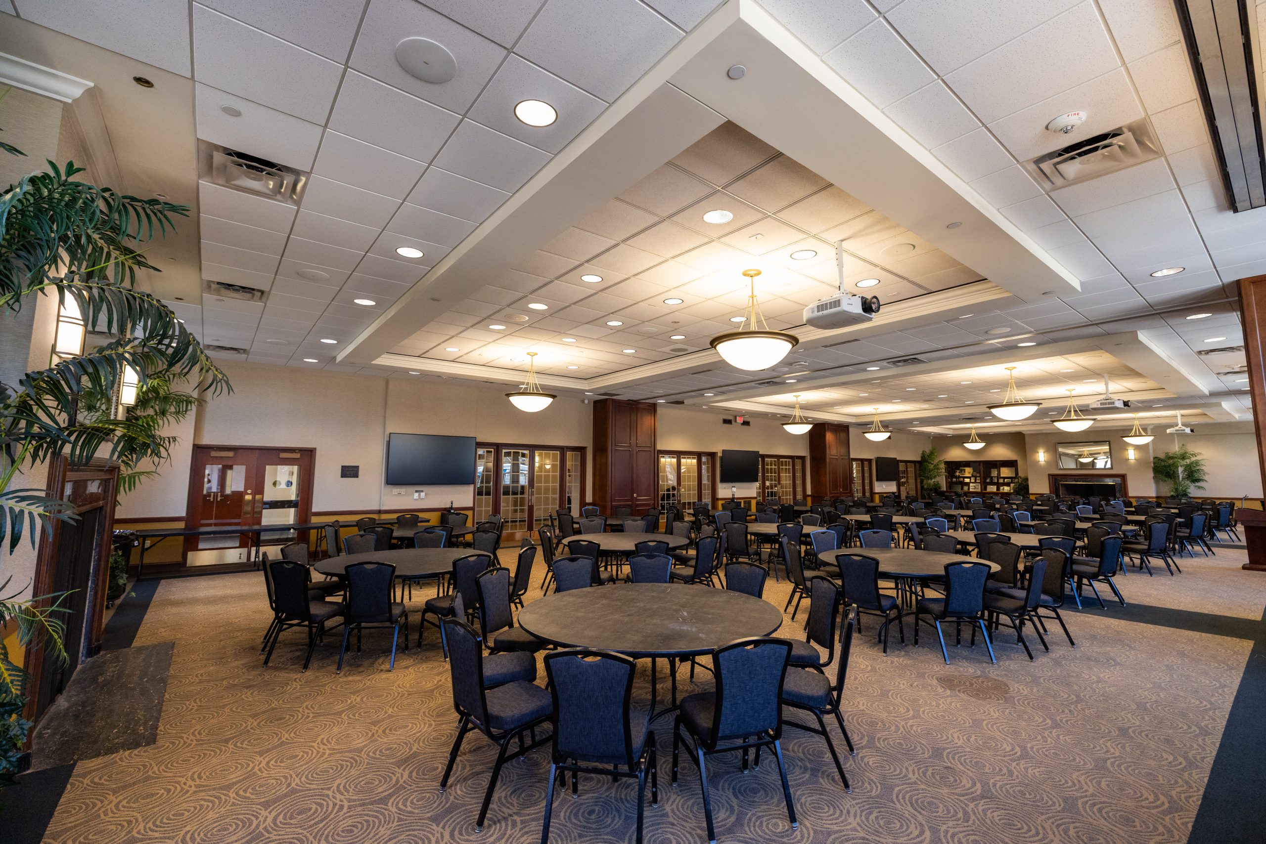 Large conference space with tables and chairs