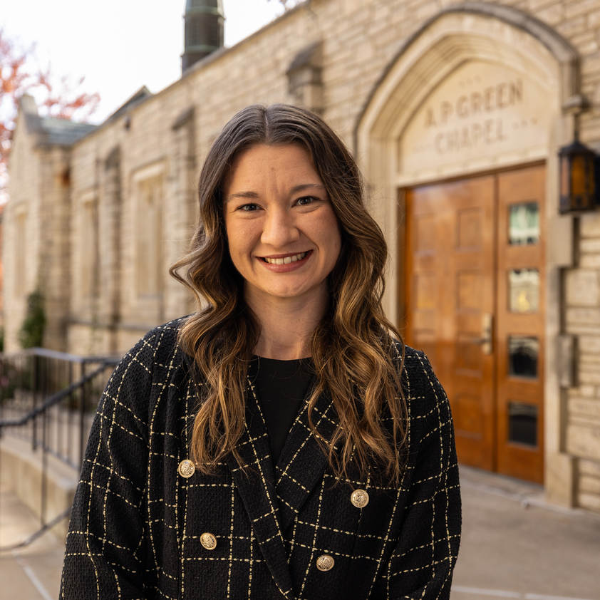 Emily Stoker at the entrance to A.P. Green Chapel